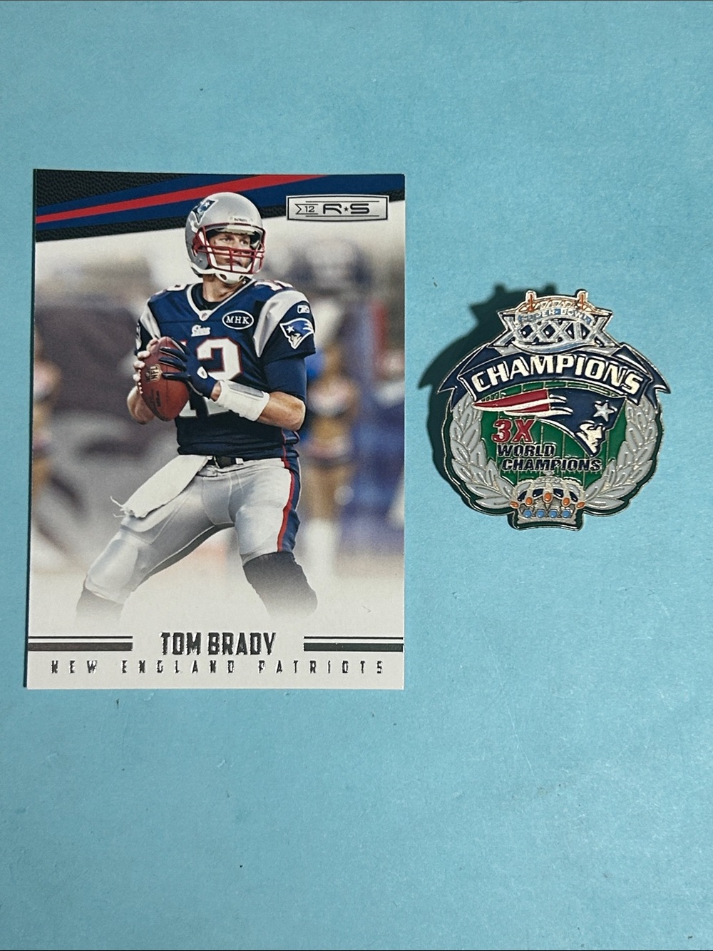 SB XXXIX + 3X New England Patriots Champions +Tom Brady 2012 Panini Card